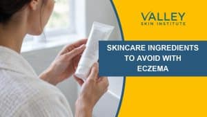 Woman reading a skincare label to check ingredients to avoid with eczema